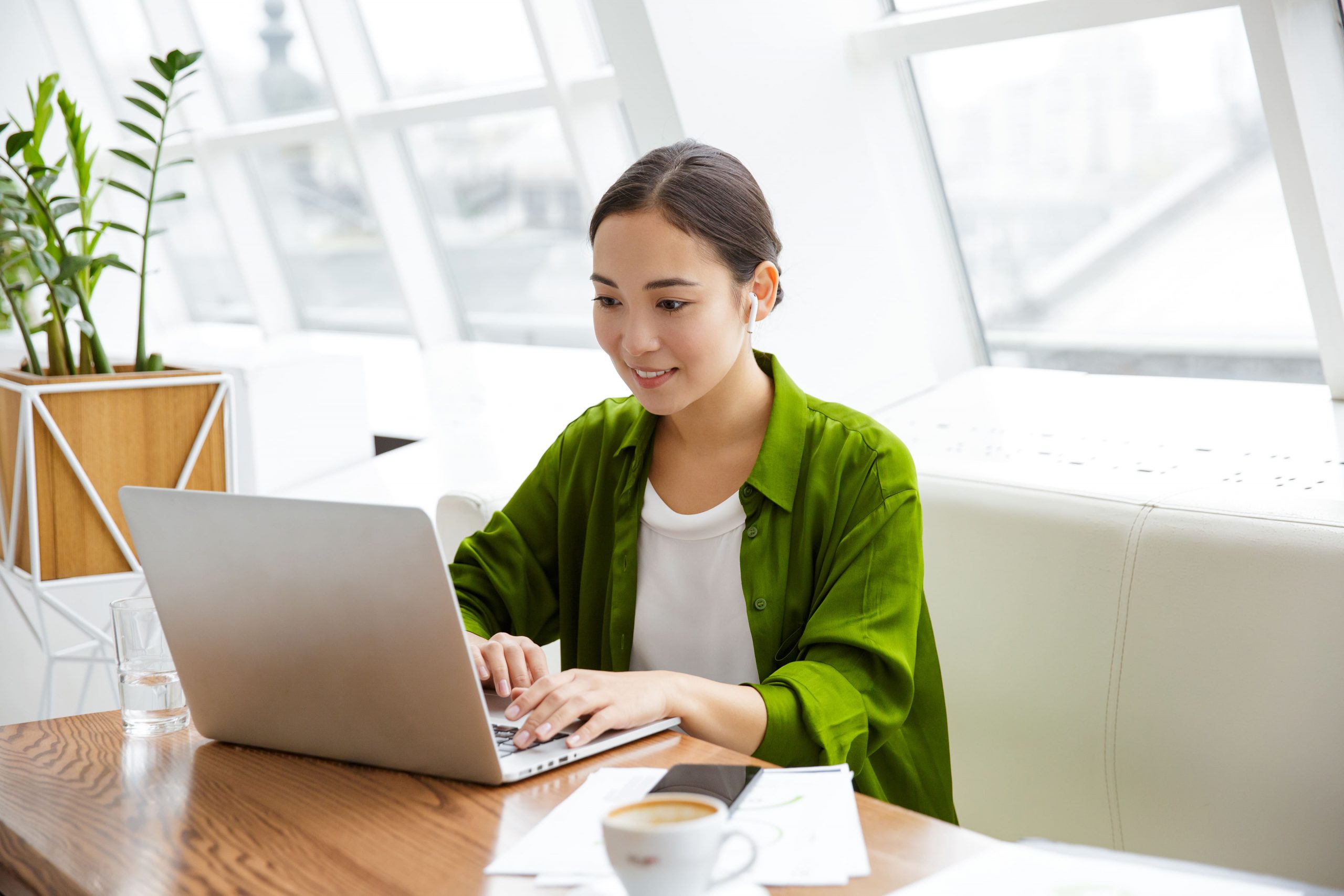 a woman using her laptop